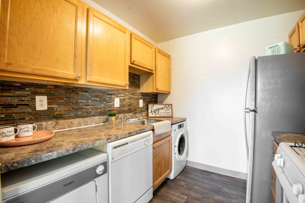 Galley style kitchen at Briarwood Place Apartment Homes in Laurel, Maryland
