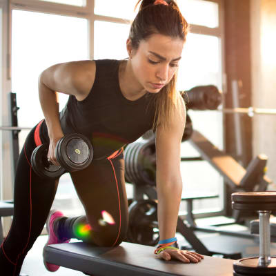 A resident working out in the fitness center at Bradford Cove in Virginia Beach, Virginia