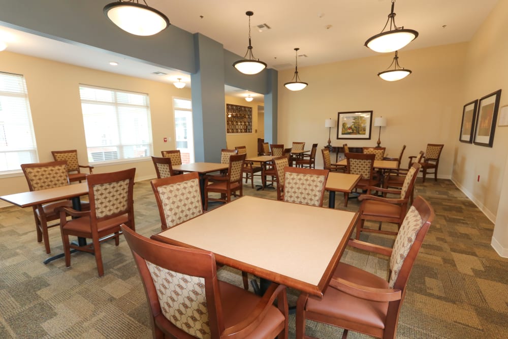 The community dining room at The Harmony Collection at Roanoke - Memory Care in Roanoke, Virginia