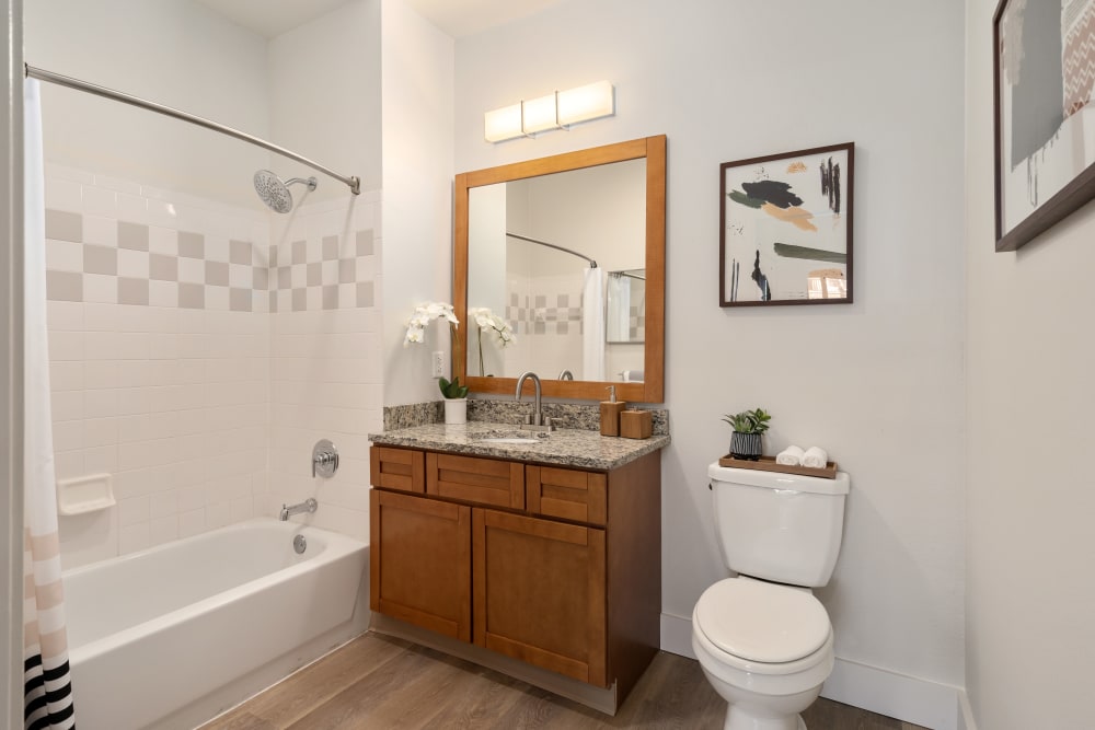 Clean bathroom with a shower tub at Sofi Parc Grove in Stamford, Connecticut