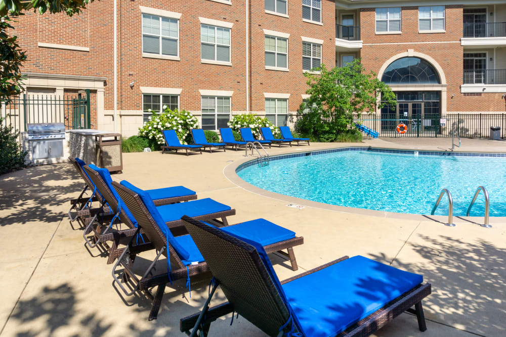 Lounge chairs by the pool at The Village at Stetson Square in Cincinnati, Ohio
