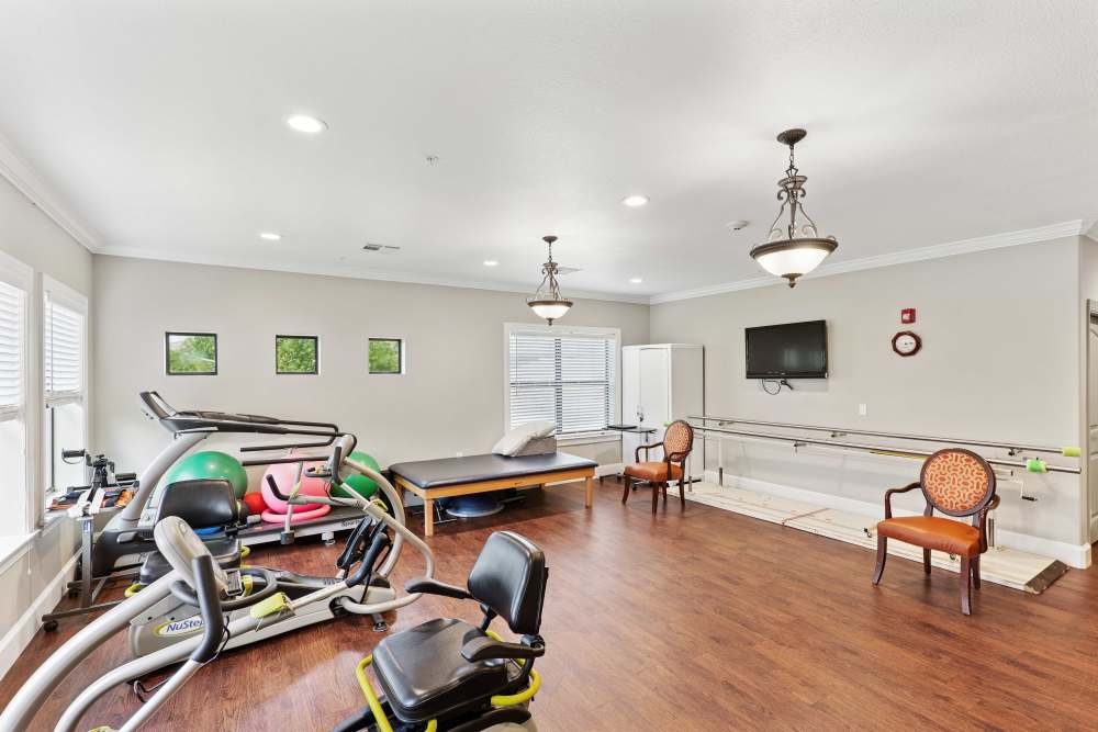 The living room of an apartment at Isle at Watercrest Bryan in Bryan, Texas