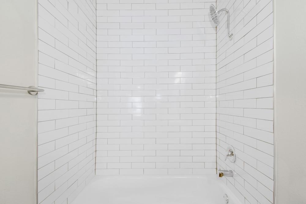 Bright bathroom with tub and shower at Easton in San Antonio, Texas