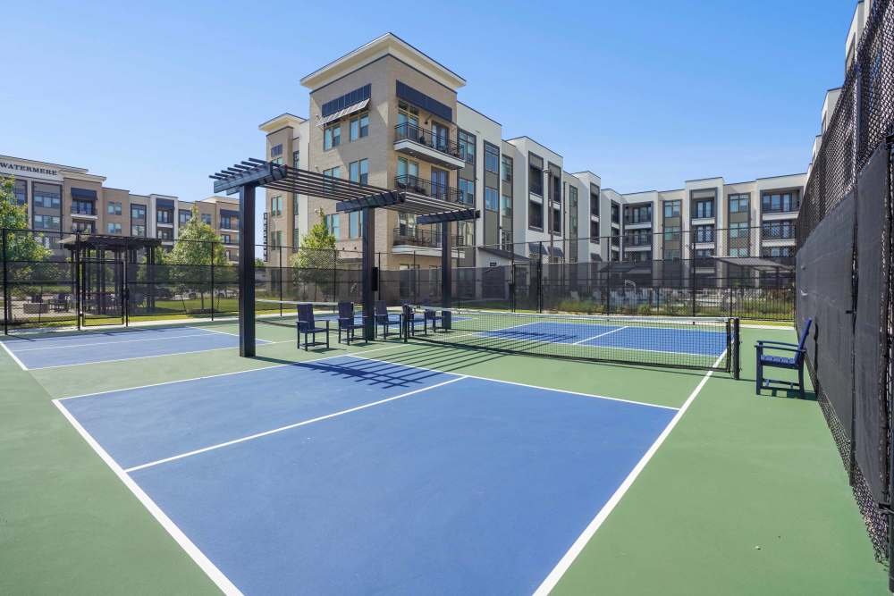 A blue and green pickleball court at The Summit at the Reserve apartments in Round Rock, Texas