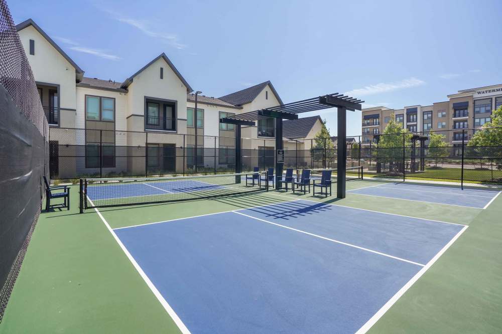 Pickleball Court surrounded by apartments at The Summit at the Reserve in Round Rock, Texas