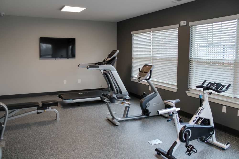 Fitness center with tv at Overlook at Elkhorn Creek in Georgetown. KY