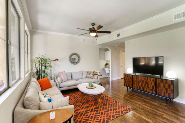 Model living room next to breakfast bar at Stone Oaks in Chandler, Arizona