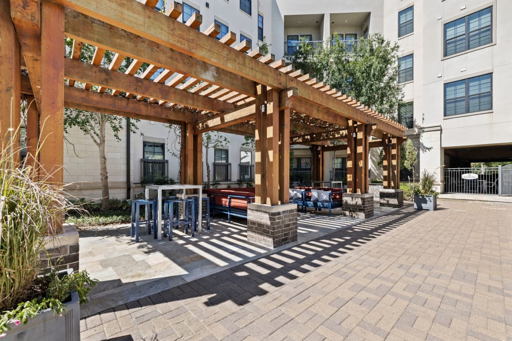 Outdoor sitting area at Olympus at Memorial in Houston, Texas