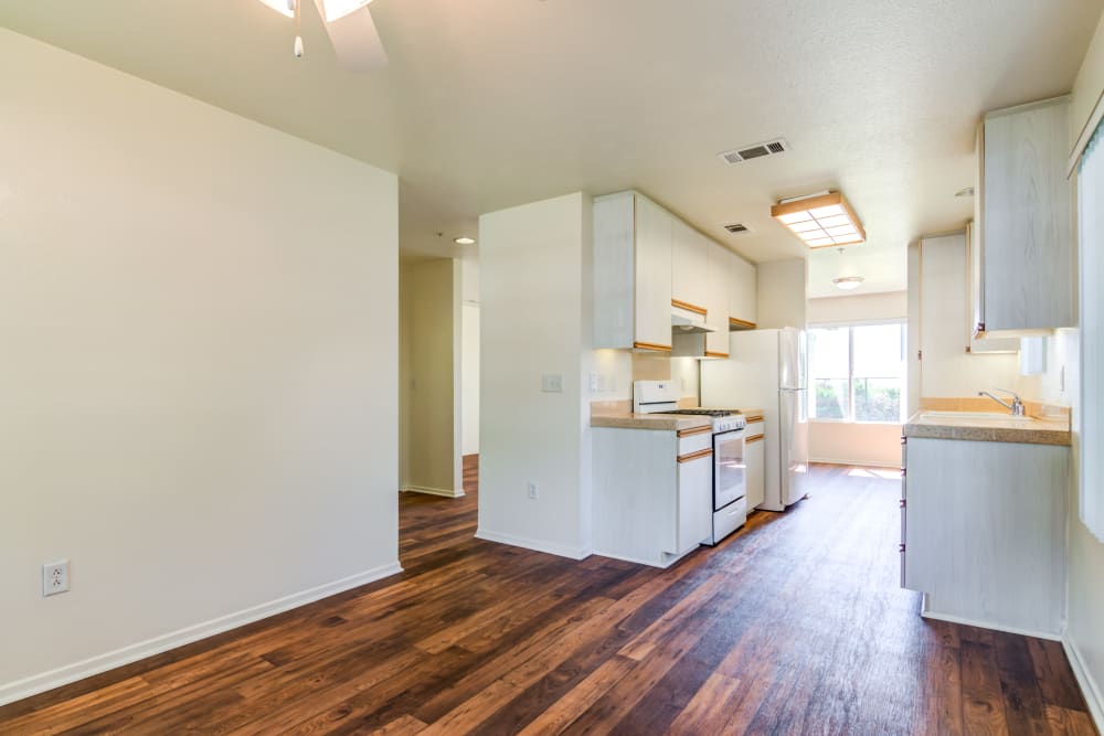 Wood flooring in an upgraded townhome kitchen at San Onofre III in San Clemente, California