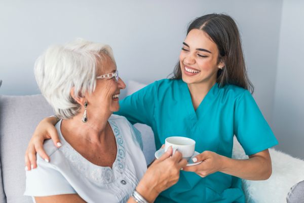 Resident and caregiver at Hillcrest of Loveland in Loveland, Colorado