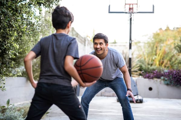 Resident enjoying a game of basketball near The Forge in Buffalo, New York