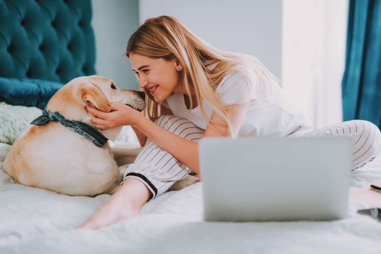Resident and her dog loving their new home at Meridian Obici in Suffolk, Virginia