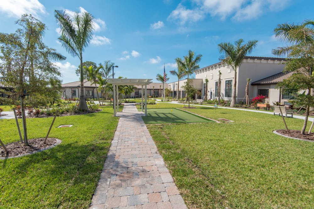 Manicured courtyard at Inspired Living Bonita Springs in Bonita Springs, Florida