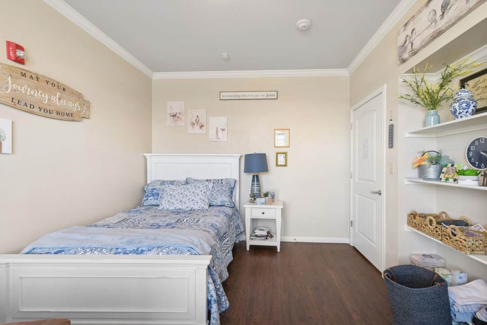 A bedroom in one of the apartments at Isle at Raider Ranch in Lubbock, Texas