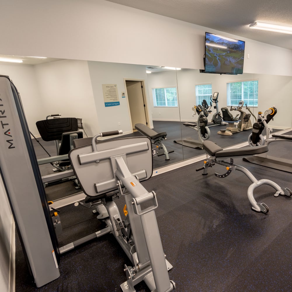 Fitness center with classes at Inspired Living Royal Palm Beach in Royal Palm Beach, Florida