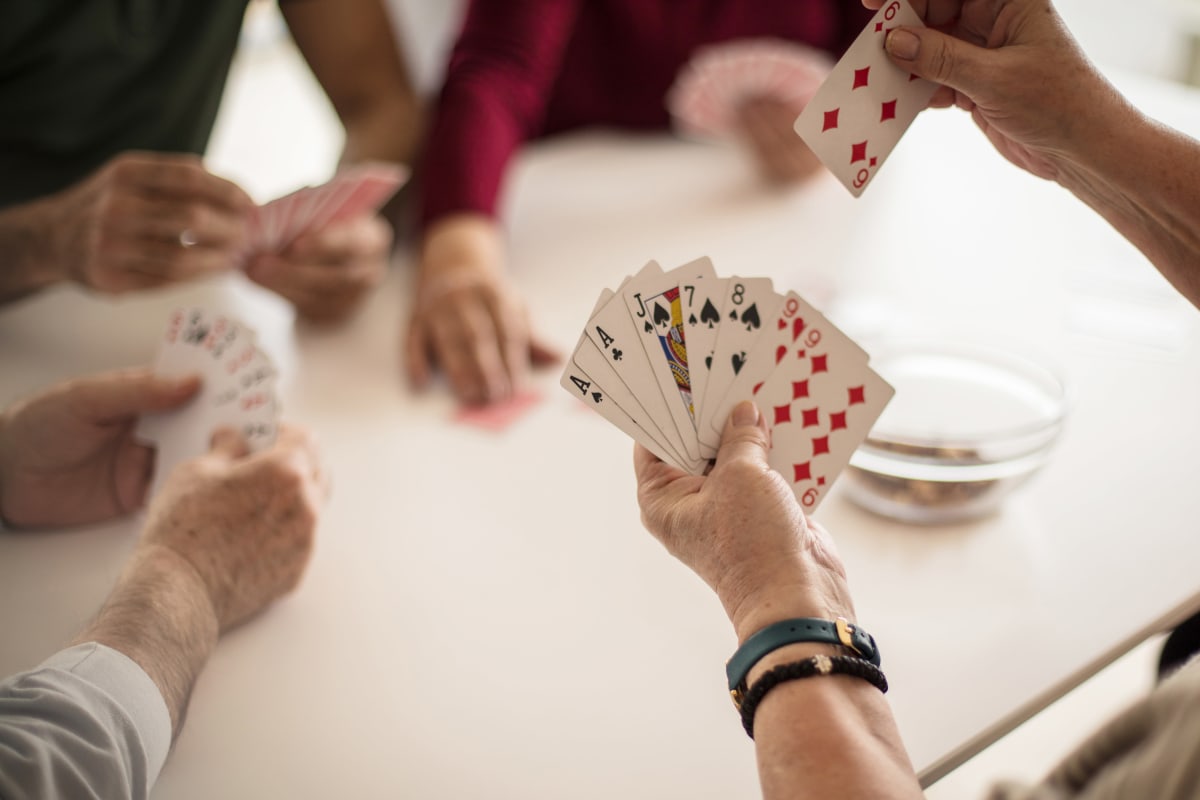 Residents playing cards at Trustwell Living at Evergreen Place in Vancouver, Washington