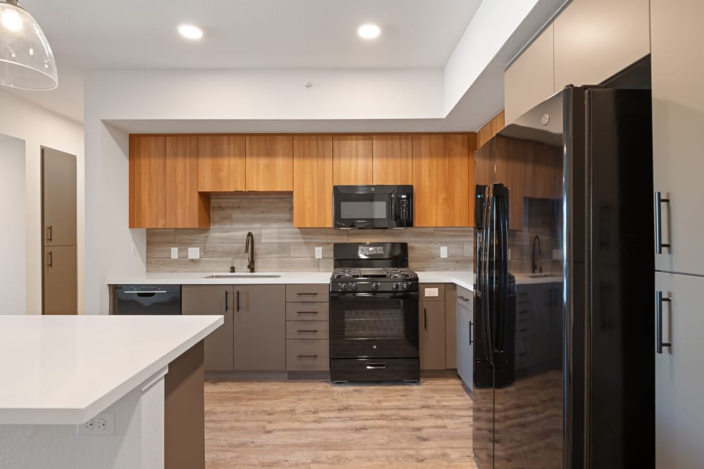 Kitchen with a kitchen island at Array Vista Canyon in Santa Clarita, California