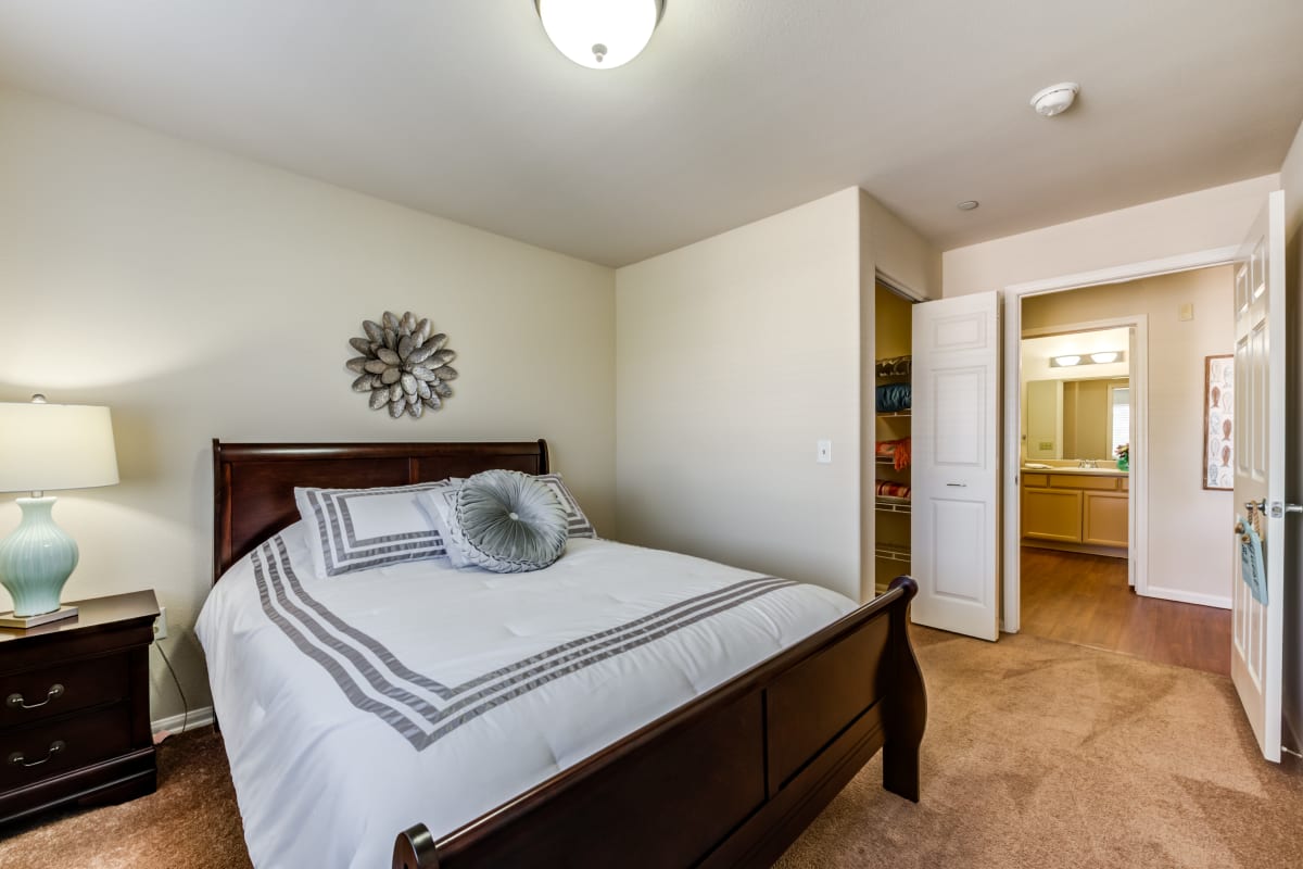 Well-lit bedroom at Cypress Place in Ventura, California
