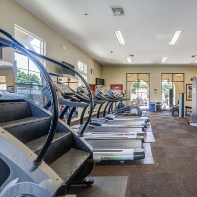 A resident working out in the Fitness Center at Santo Terrace in San Diego, California