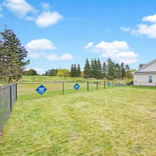 Fenced dog park at The Links at CenterPointe Townhomes in Canandaigua, New York