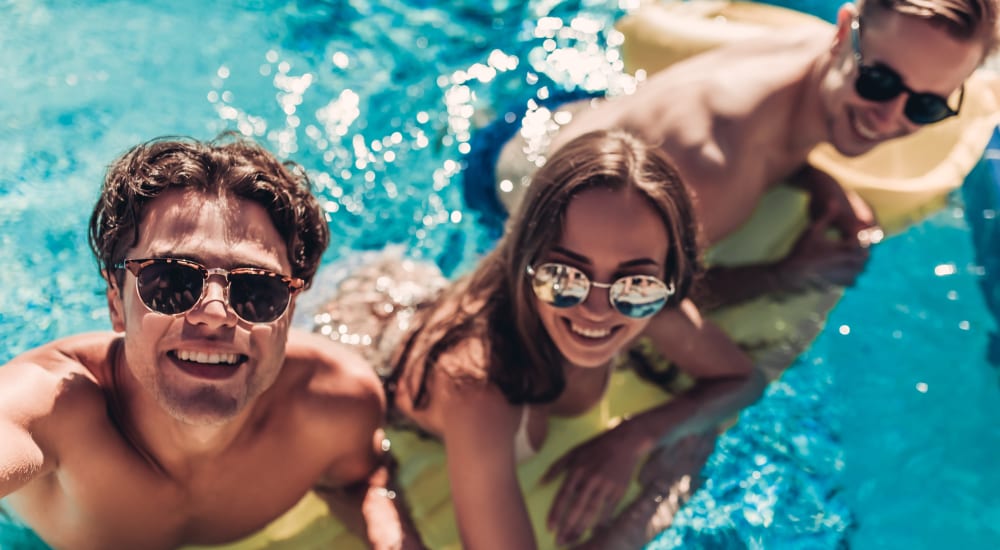 Residents enjoying their time at the pool at Crystal Springs in Fort Worth, Texas