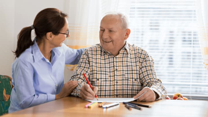 a nurse taking care an older man