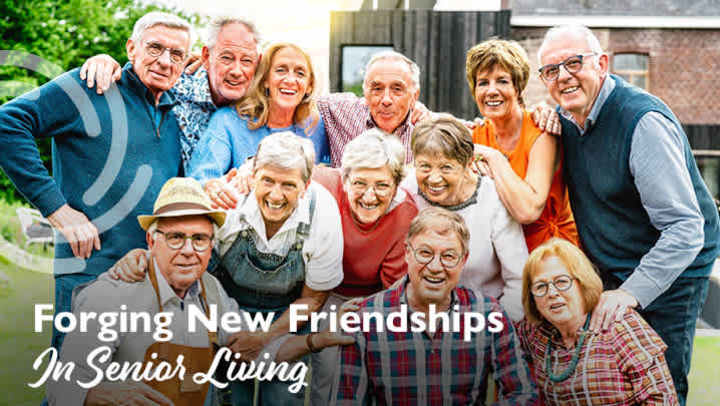 Happy senior residents in a friendly group photo during Fall