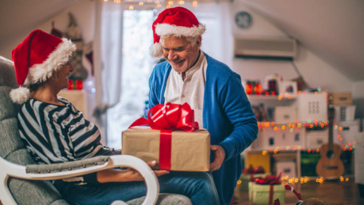 a couple of seniors celebrating christmas