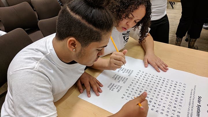 Youth from The Fairways in Worcester race the clock during the 2018 Academic Olympiad.