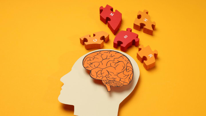 head with puzzles for Alzheimer