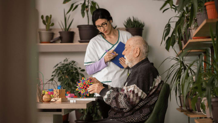 a caregiver doing cognitive activities with an older adult