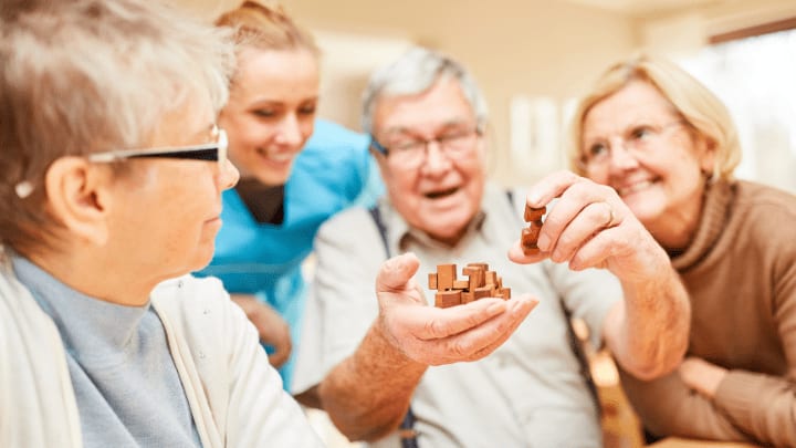 a group of seniors having fun with puzzle breakers