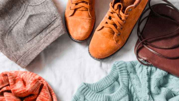 chino pants, orange shoes, teal knitted sweater, bag, and red scarf