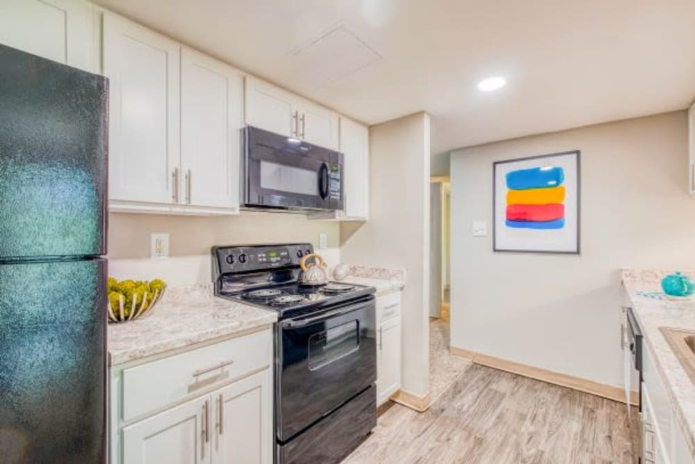 Apartment interior with appliances at Preserve at Cradlerock Apartment Homes in Columbia, Maryland. 