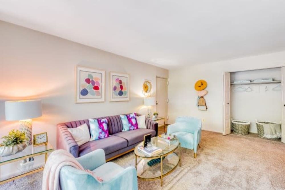Living Room with storage closet at The Timbers at Long Reach Apartments in Columbia , Maryland