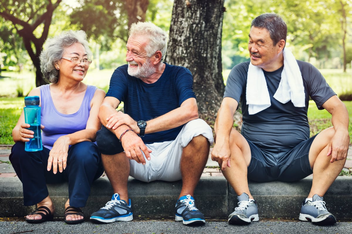 Residents resting after an invigorating walk outdoor at a Meridian Senior Living community