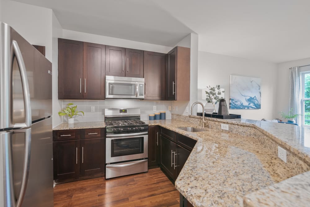 Kitchen with modern appliances at Sofi Gaslight Commons in South Orange, New Jersey