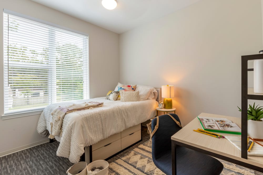 Bedroom with a view at UNCOMMON Wilmington in Wilmington, North Carolina