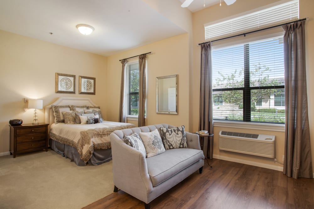 A decorated apartment bedroom at Clayton Oaks Living in Richmond, Texas