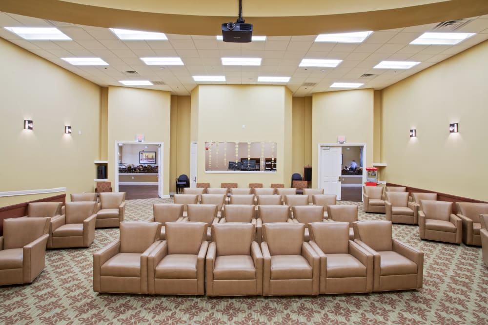 The community movie theater at Clayton Oaks Living in Richmond, Texas