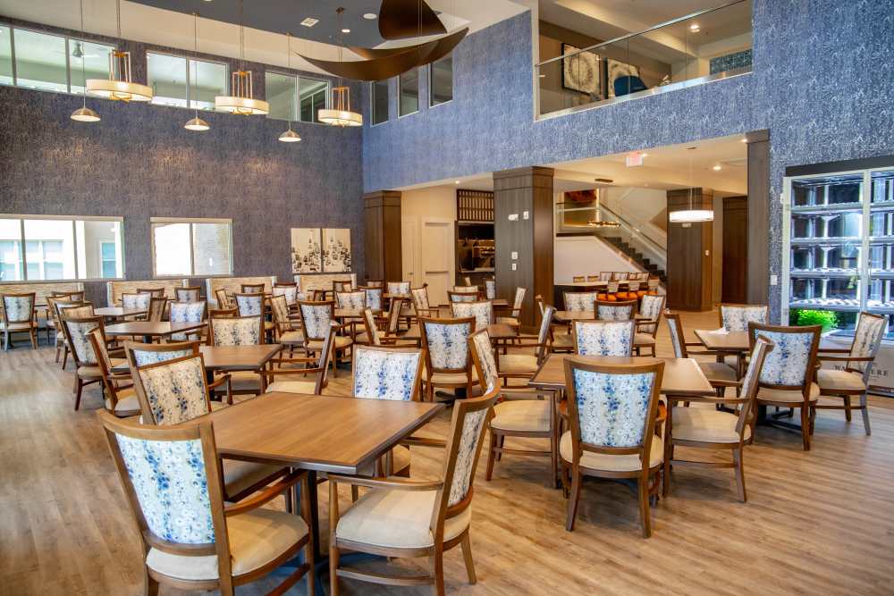 Residents enjoying tea and sunshine outside at Watermere at the Preserve in North Richland Hills, Texas
