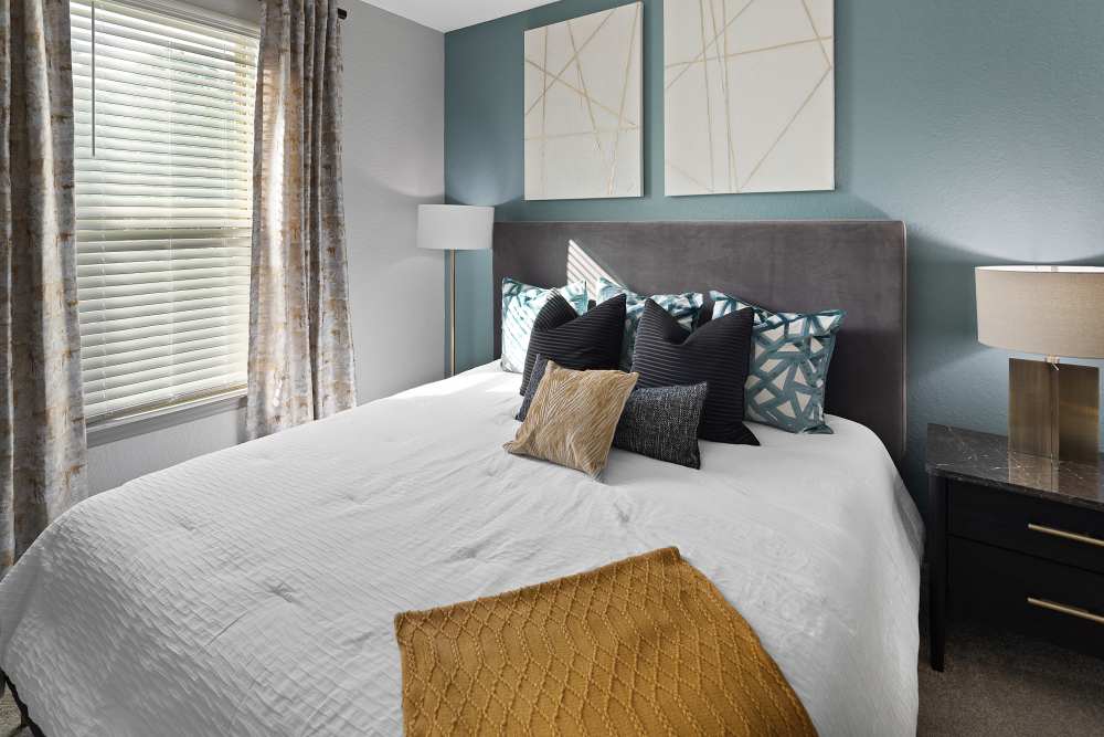 Bedroom with a large window at Integra 289 Exchange in DeBary, Florida