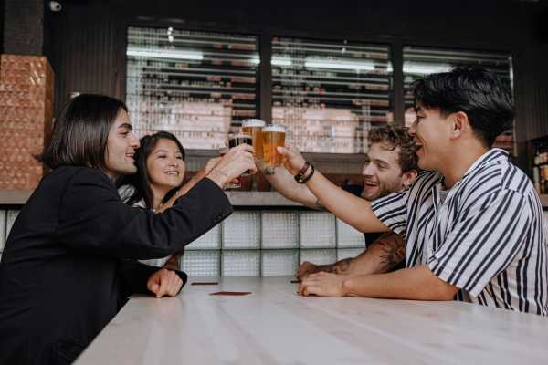 Resident friends having drink at a bar near Charleston in San Antonio,Texas