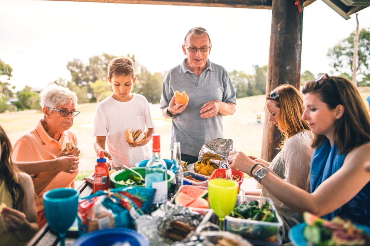 A family gathered around a table for lunch at Sandpiper Village in Mt. Pleasant, South Carolina