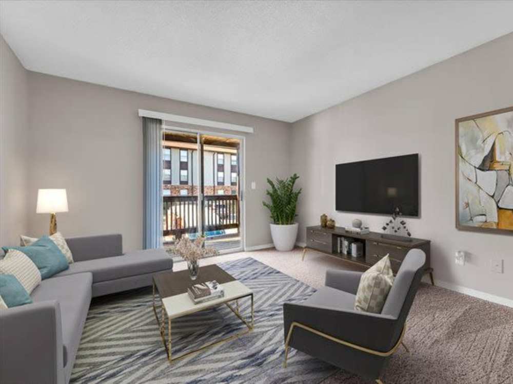 A spacious well furnished living room at Woodbrook in Gardendale, Alabama