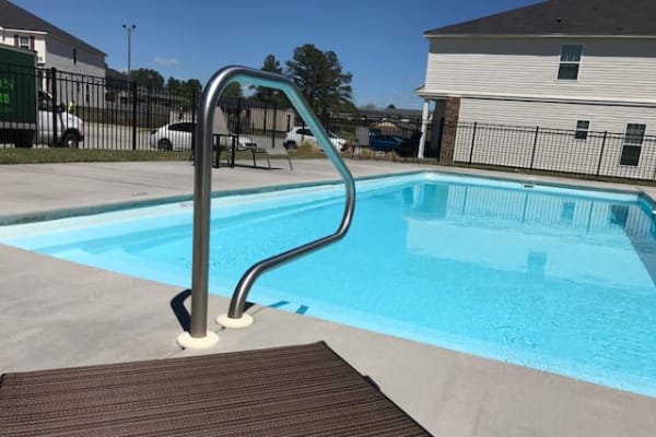 A resident swimming pool at The Village at Mill Creek in Statesboro, Georgia