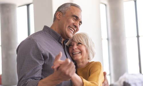 A resident couple dancing at Merrill Gardens. 