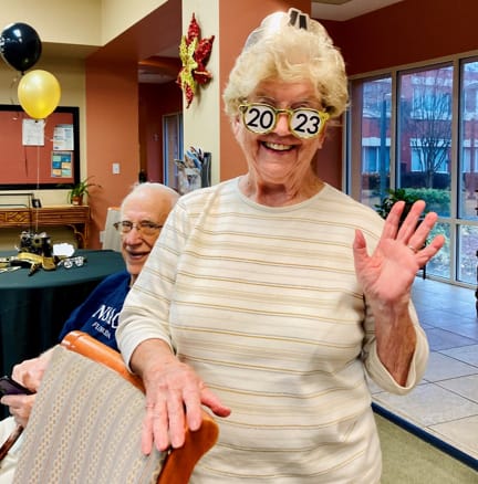 woman wearing 2023 New Year's eye glasses