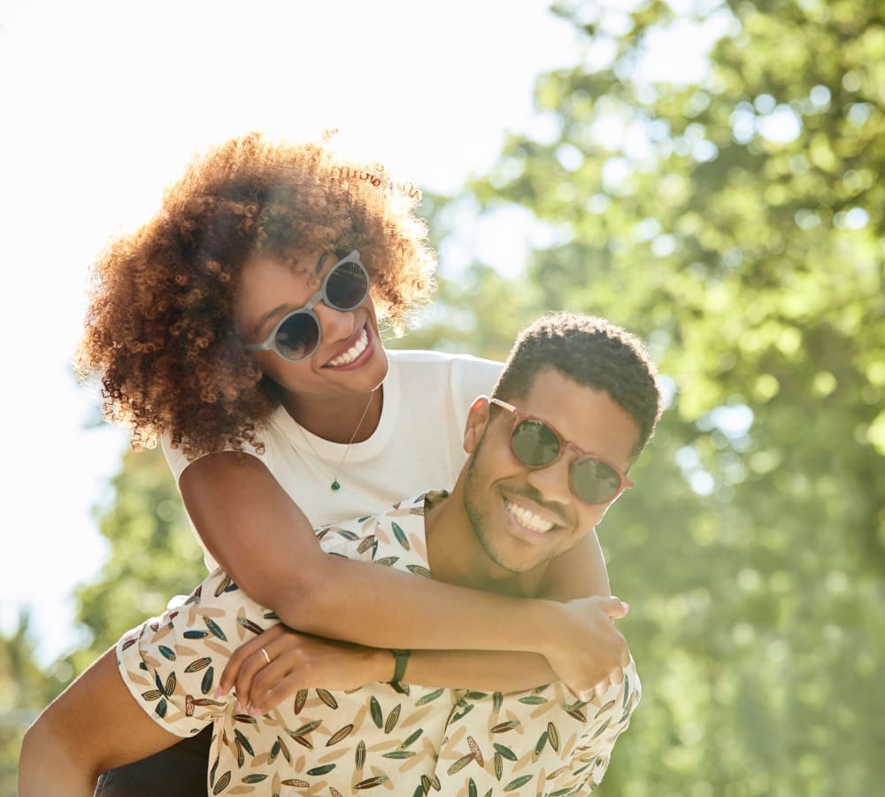 A happy couple enjoying the neighborhood near Sofi Danvers in Danvers, Massachusetts