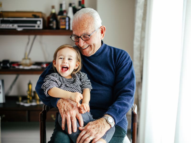 A resident with his grandson at Garden Place Red Bud in Red Bud, Illinois. 